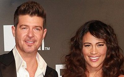 Robin Thicke with his wife, Paula Patton
